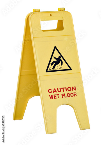 Isolated yellow wet floor sign with text