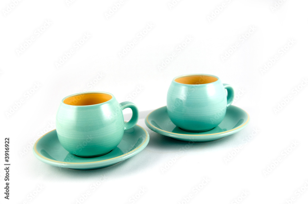 2 cups and saucers waiting to be filled