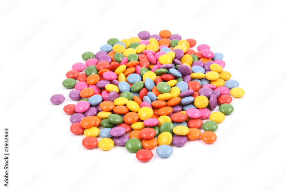 pile of colorful candies isolated on white pile of colorful candies isolated on white