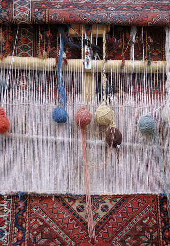 loom in Iran carpet factory photo