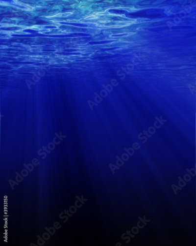 Sunlight shining through dark blue water