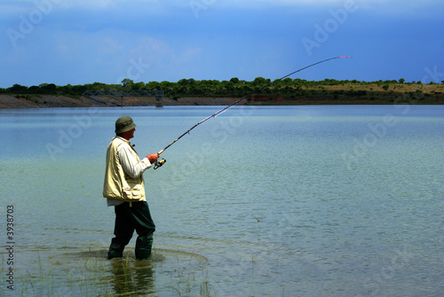 Fisherman catching a fish