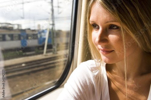 young woman in vintage train