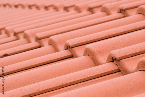 red sunlit roofing tiles texture