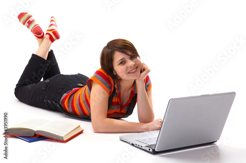 Yong student woman whit book and laptop