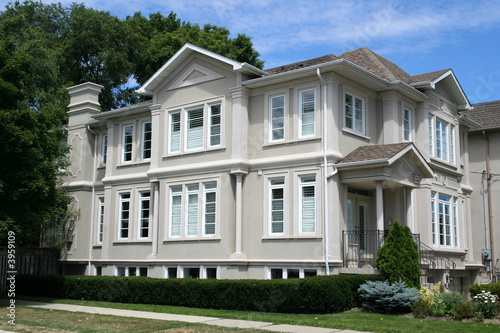 Modern stucco house with gables