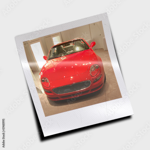 red luxury sports car on display at car show