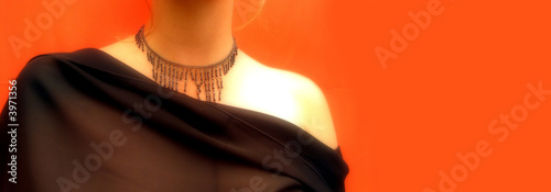 Detail of a girl wearing fashion necklace photo