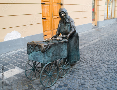 Old woman helping parents