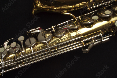 Saxophone against black, horn and keys