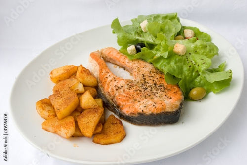 Grilled Salmon with Salad-Lettuce,fried Potatoes.
