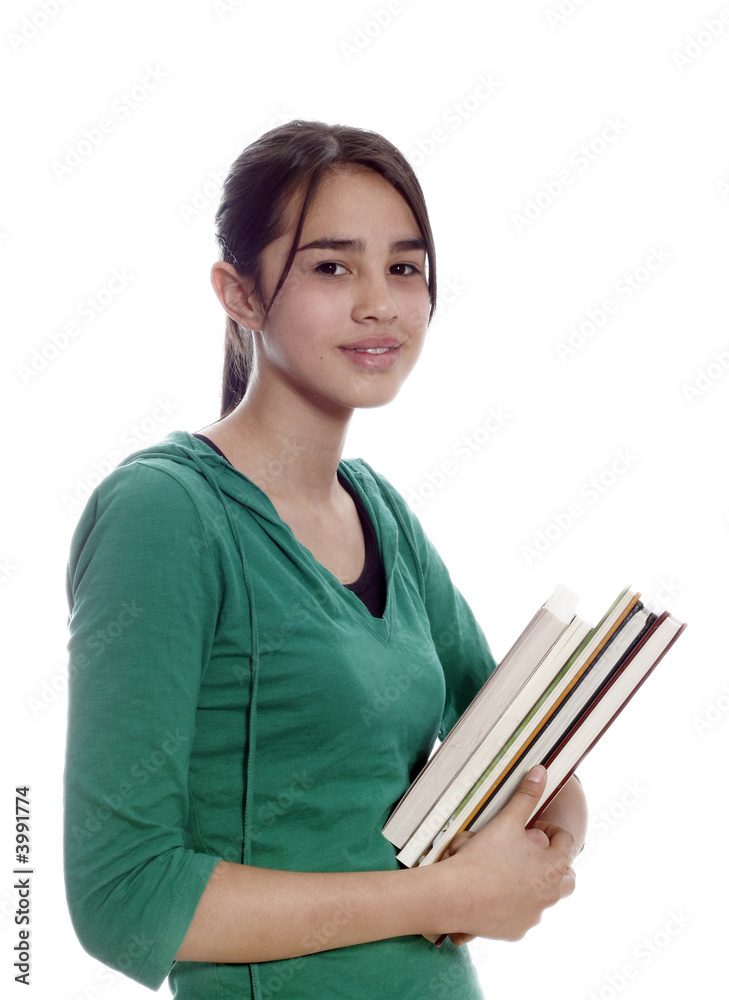 Female university student smiling and carrying some notebooks Female university student smiling and carrying some notebooks
