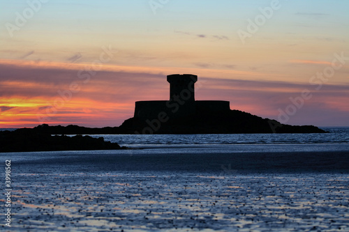 Round fort and beach sunset