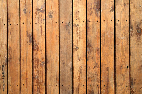 Close up of weathered wooden garden decking.
