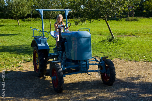 Farmer's daughter on a tractor