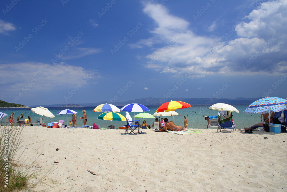 beach with colorful umbrellas
