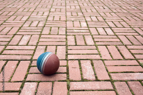 Ball on a pavement tiles photo