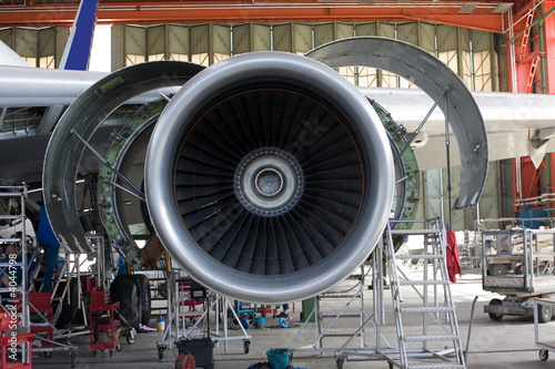 opened aircraft engine in the hangar