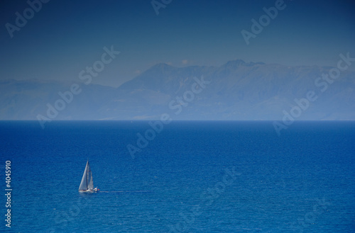 Sailing boat at an open sea