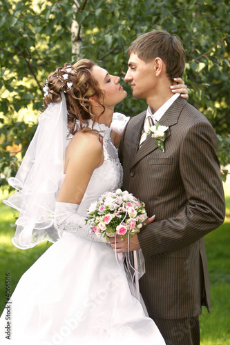 the bride and the groom out doors