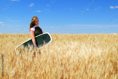 Prairie Boarder Girl in Wheat Field