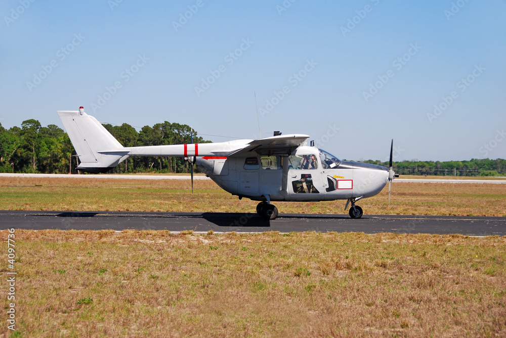 Vietnam era reconnaissance airplane preparing for takeoff Vietnam era reconnaissance airplane preparing for takeoff