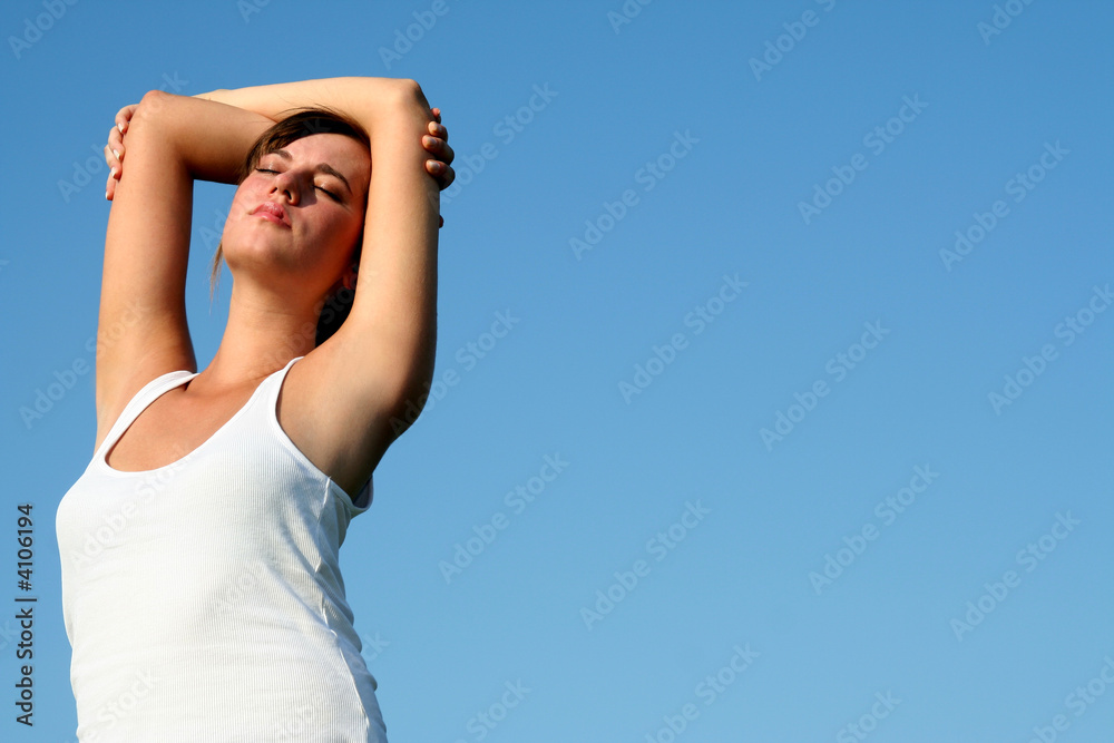 Beautiful woman in front of the sky Beautiful woman in front of the sky