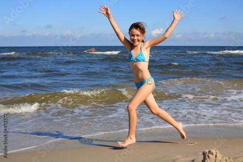 Girl running on beach