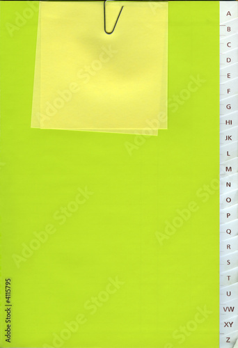 Phone book - A to Z - with a Yellow Post-it photo
