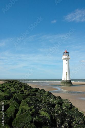 Lighthouse sand and rocks