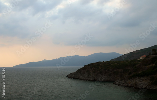Mediterranean sea bay during sunset