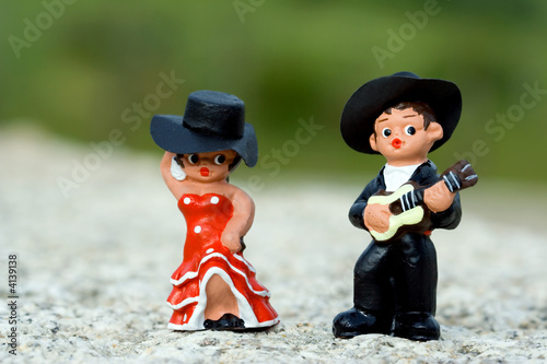Guitarist and a Spanish dancer doll