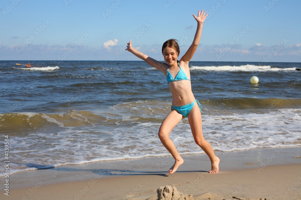 Girl running on beach Girl running on beach