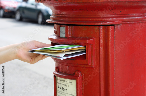 Fotografie, Obraz posting many letters to red british postbox on street