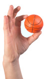 Brush of a hand with basketball ball