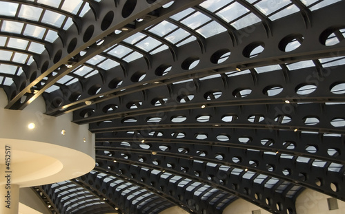 Interior of round dome with beams radiating from central column