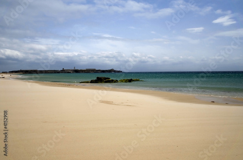 Sandy beach in Spain. Sky and clouds.