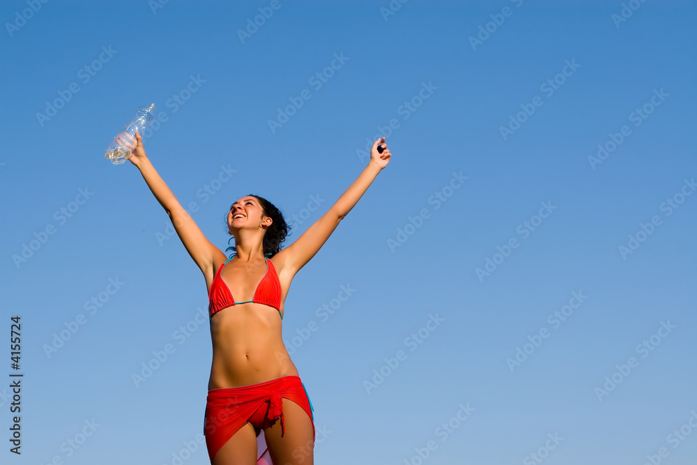 Beautiful young woman with water on the hand Beautiful young woman with water on the hand