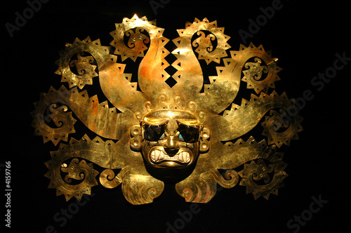 Peruvian ancient mask made out of gold photo