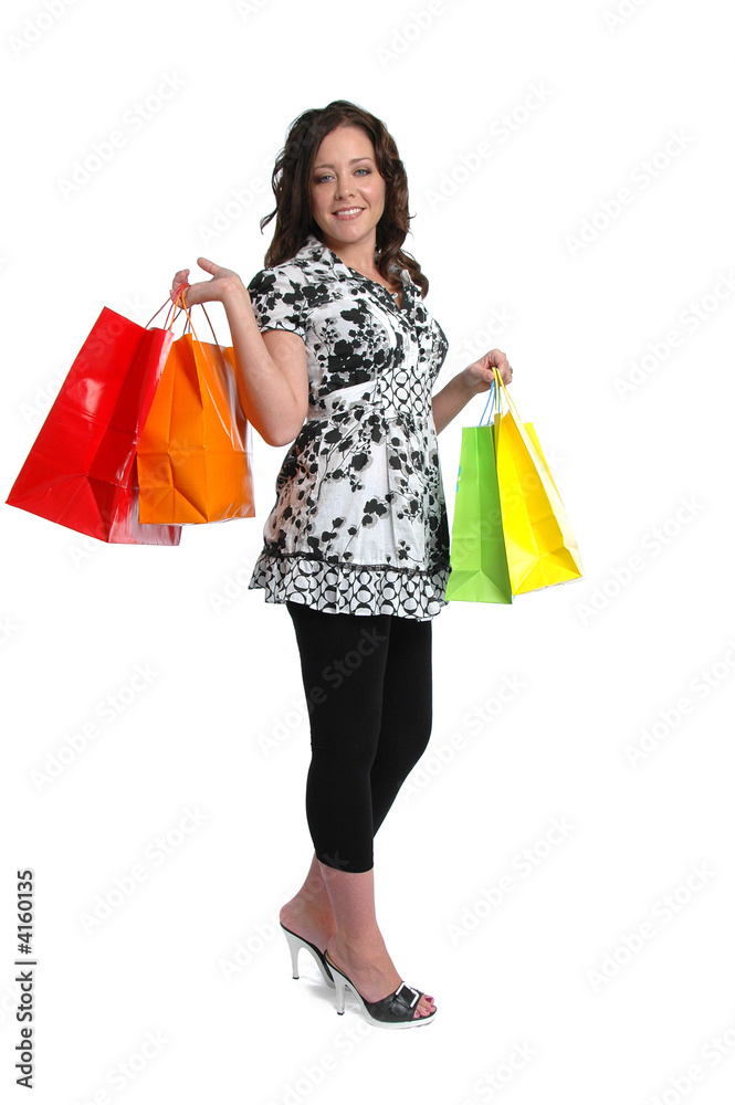 Beautiful girl with shopping bags standing Beautiful girl with shopping bags standing