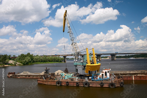 hydraulic dredge on barge photo