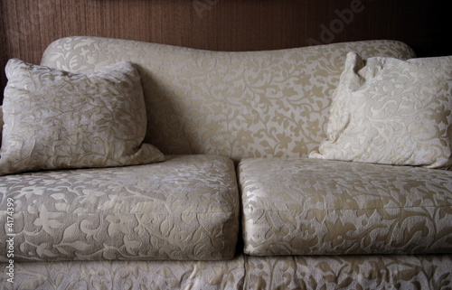 Fototapeta Naklejka Na Ścianę i Meble -  Detail of neutral patterned sofa in living room