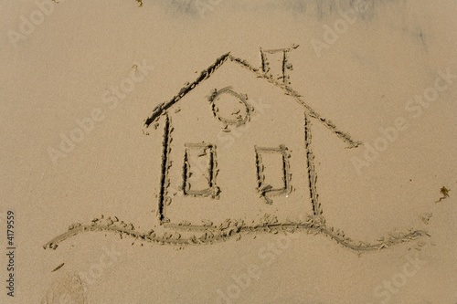 Fotografie Drawing of the building on sea sand
