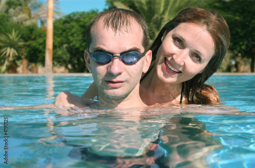 man and woman in the pool © Pavel Losevsky