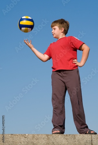 boy throws ball