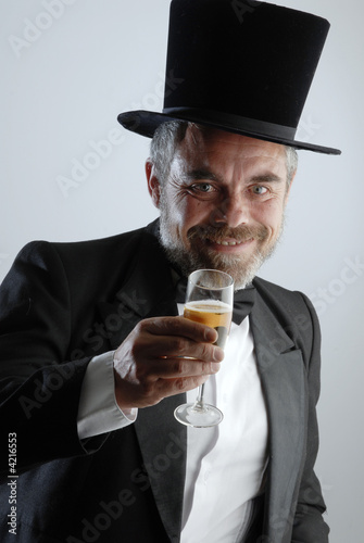 man with glass and cigar