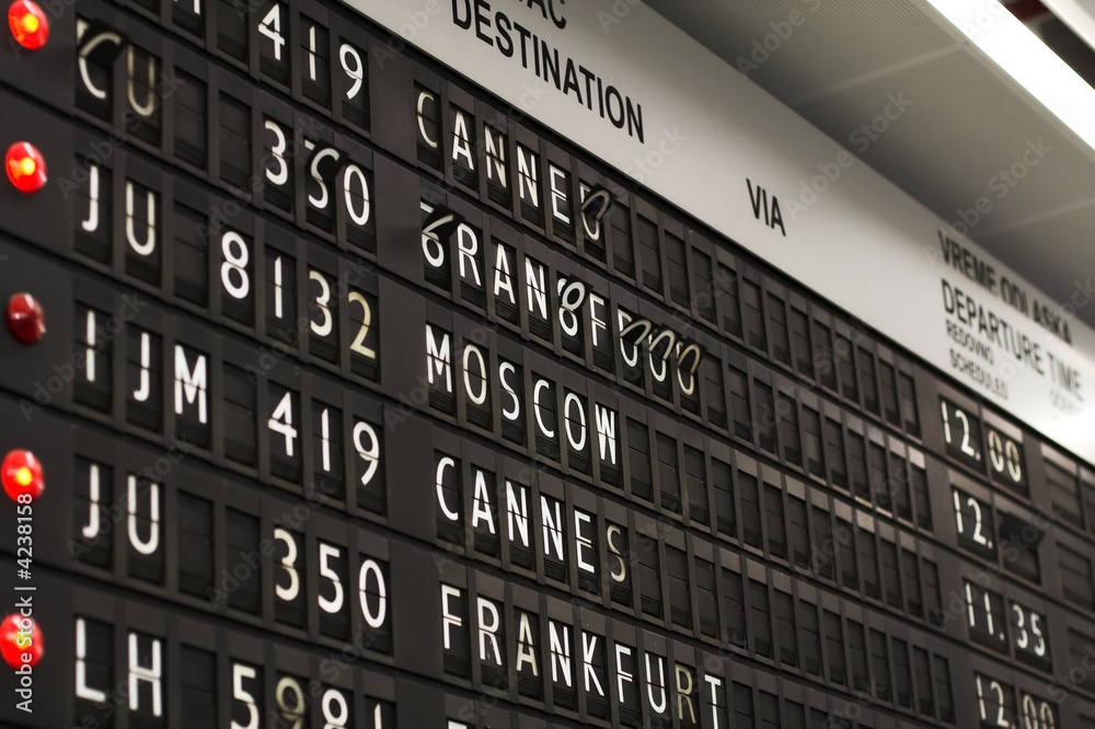 Obraz premium Flight info board on airport