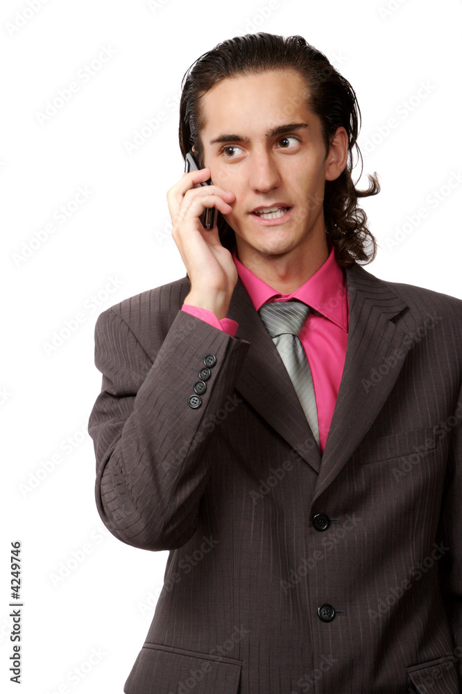 emotional businessman talking by mobile phone. on white emotional businessman talking by mobile phone. on white