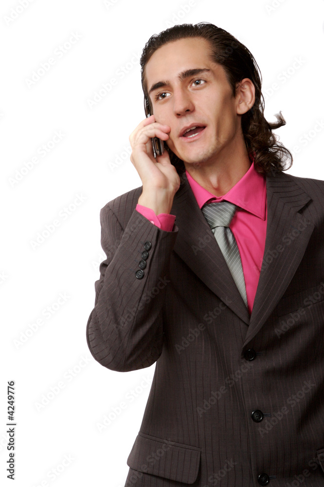 emotional businessman talking by mobile phone. on white emotional businessman talking by mobile phone. on white