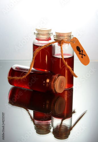 three bottles with poison